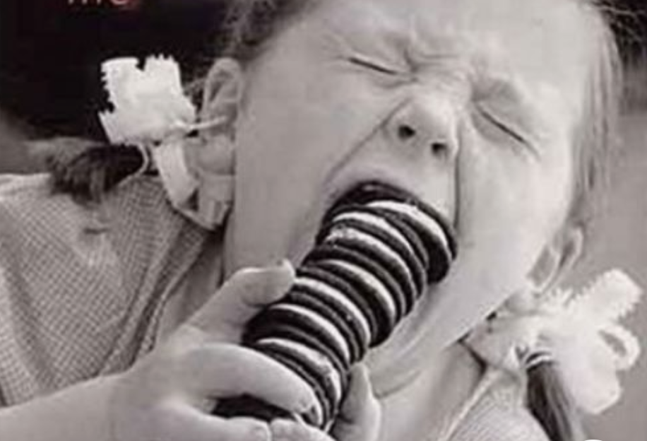 Eating stack of Oreos