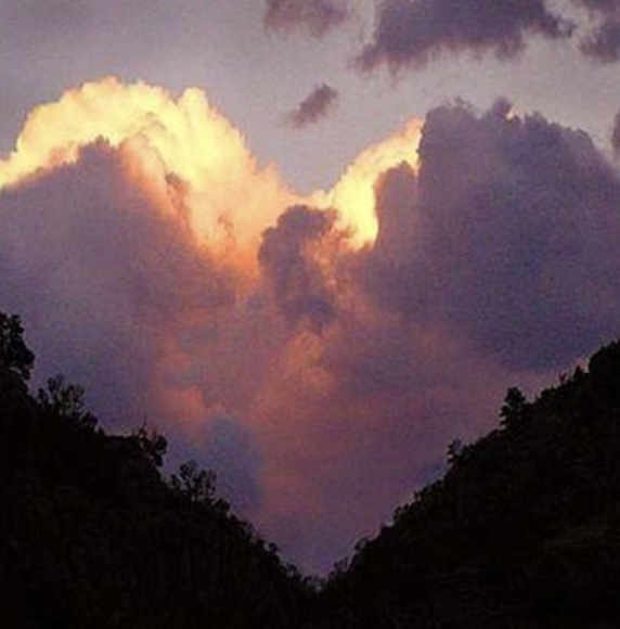 Agape love heart in clouds