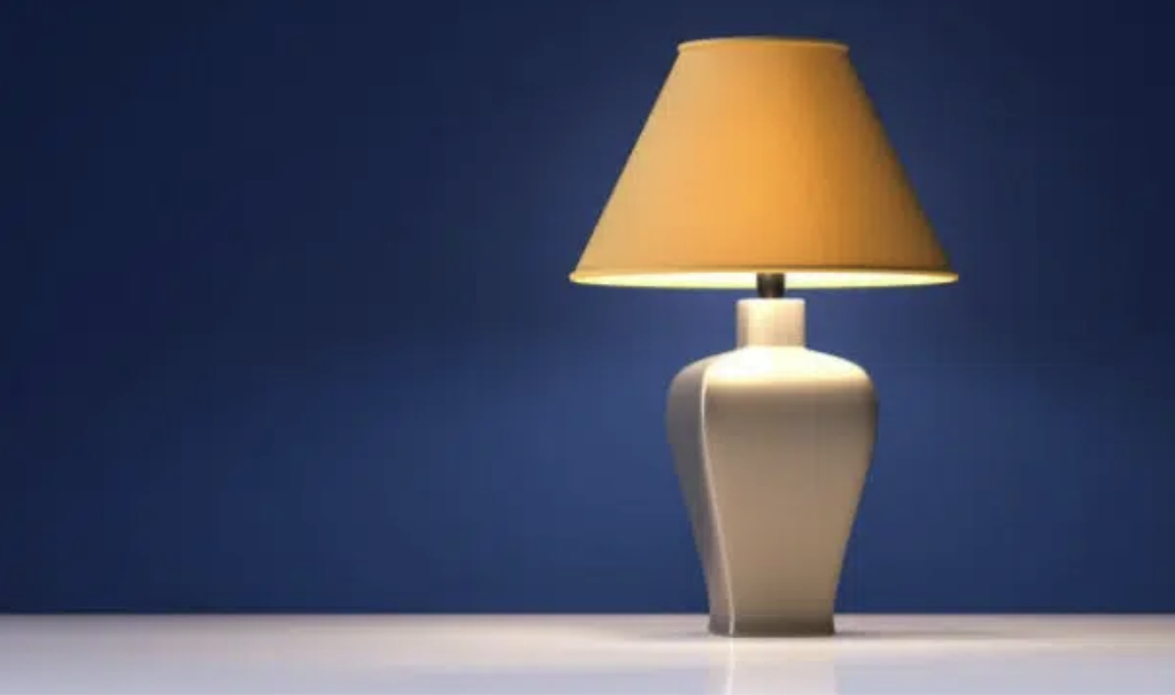 Lamp casting light onto table