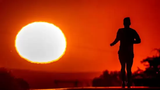 Person standing in extreme heat of sun