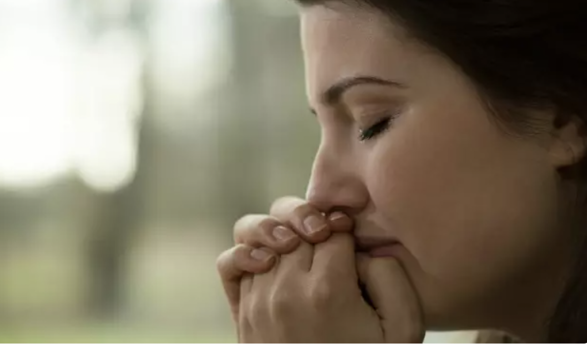 Woman persistently praying