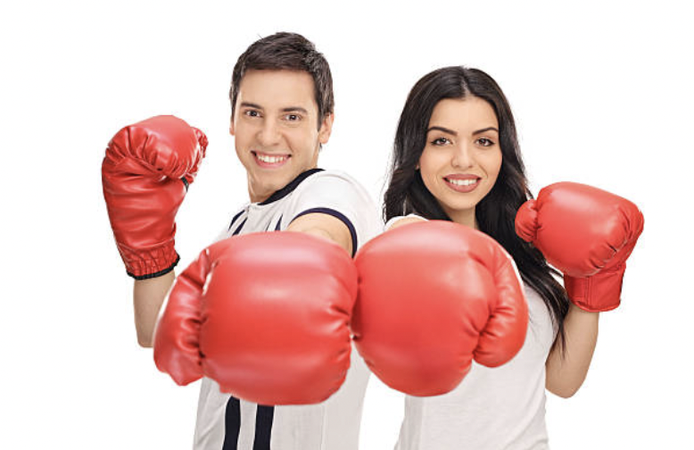 Husband and wife in boxing gloves