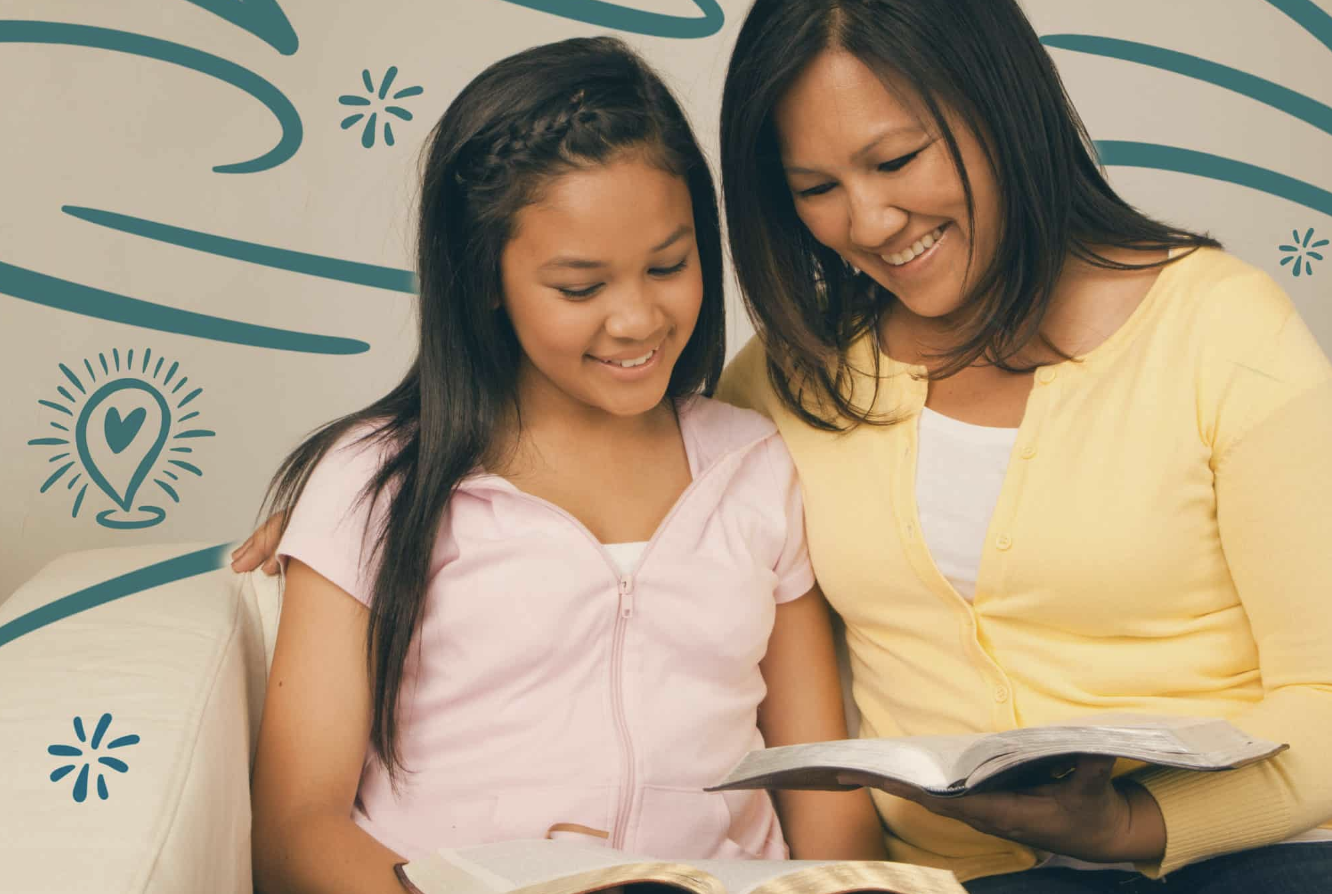 Mom studying Bible with young daughter